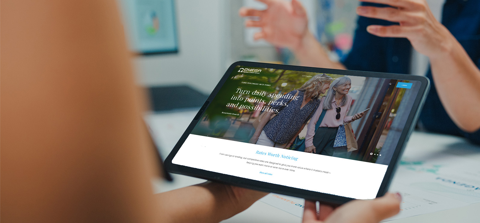 Person looking at bank website on a tablet.