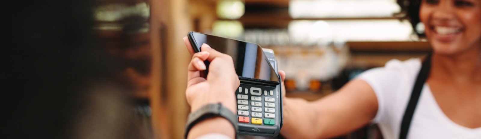 a person making a digital purchase with their phone