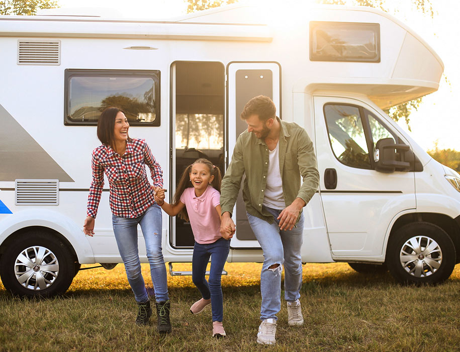 a family of three with their RV